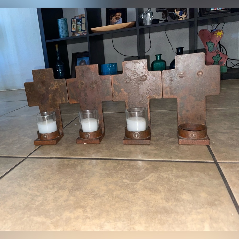 Selling candle cross holders they are Jan barboglio if you wnat one candle is150
